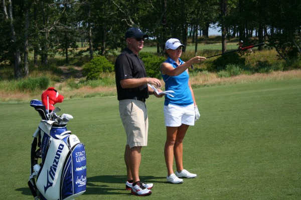 Stacy Lewis and her caddie on Monday at Sebonack