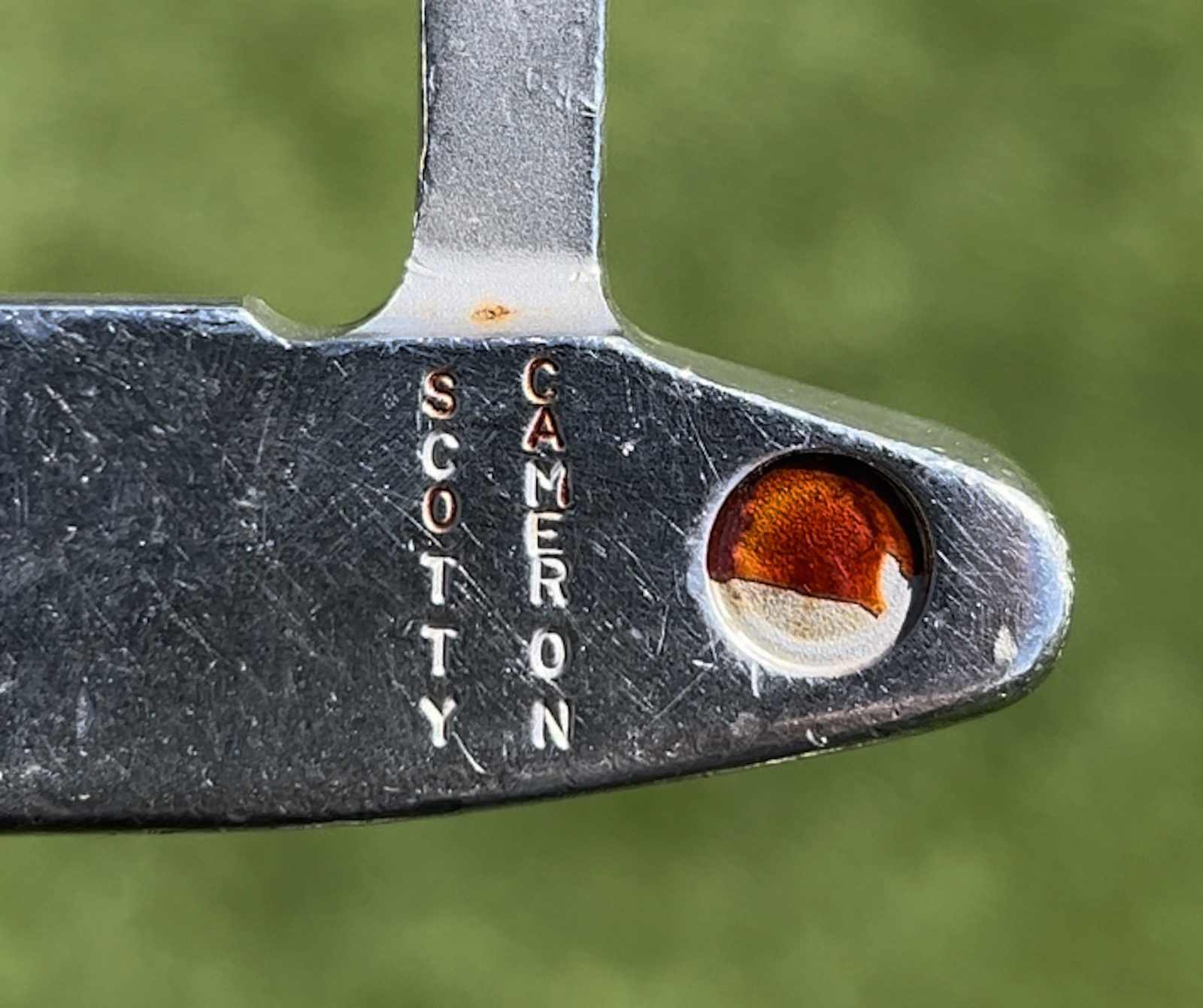An UP-CLOSE look at Tiger Woods' famous Scotty Cameron putter